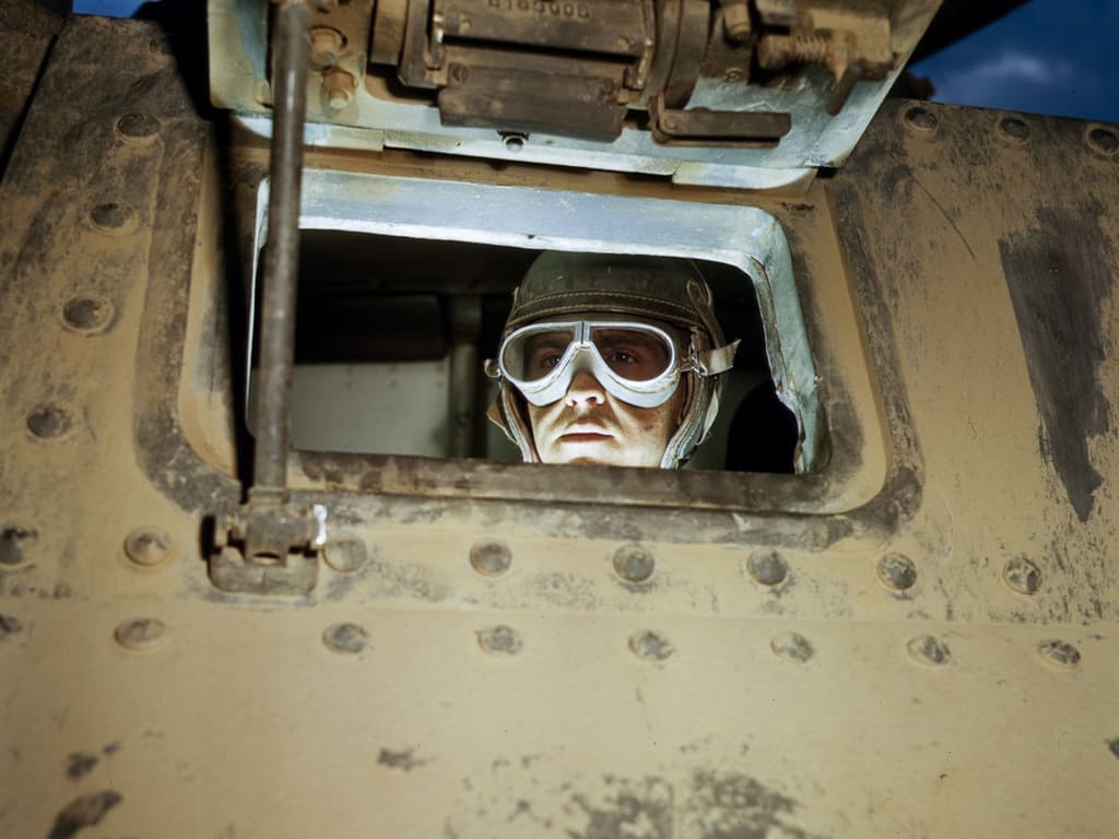 Life at Fort Knox in 1942 - 1. A tank driver looks out of the front of his tank