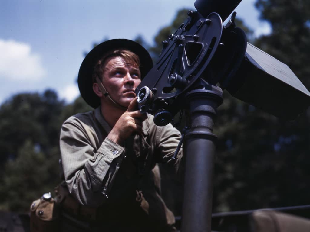 Life at Fort Knox in 1942 - 12. A Browning machine gun is aimed by an infantryman