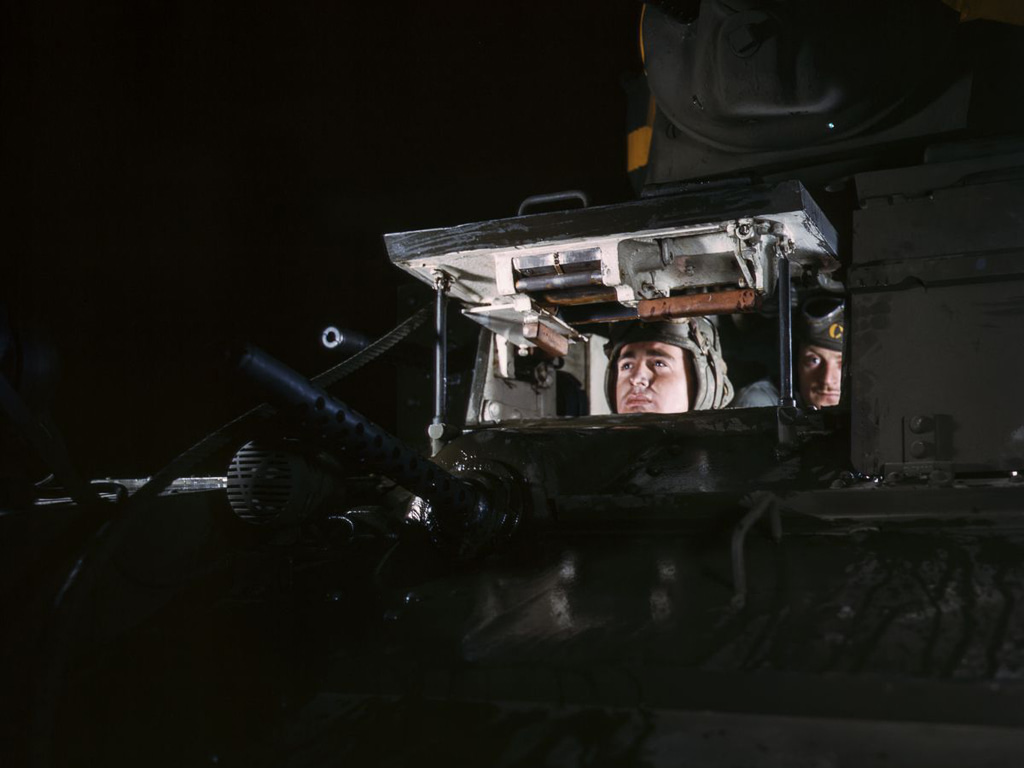 Life at Fort Knox in 1942 - 14. A tank driver looks on into the distance.