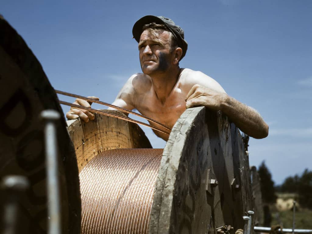 Life at Fort Knox in 1942 -17. A worker puts in a new power line at the rapidly-expanding Fort Knox.