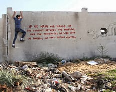 Banksy Sneaks Into Gaza To Create Controversial Street Art israel-palestine-conflict-gaza-strip-street-art-banksy-7