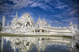 Temple Wat Rong Khun and futuristic religion temple