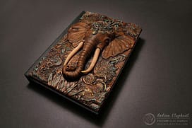 Latvian Artist Aniko Kolesnikova Creates Fantastic Book Covers fantasy-polymer-clay-book-covers-by-aniko-kolesnikova-1-677x451