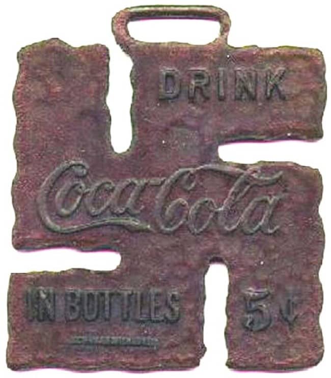Swastikas in History - Vintage swastika Coca-Cola pendant from the 1920s