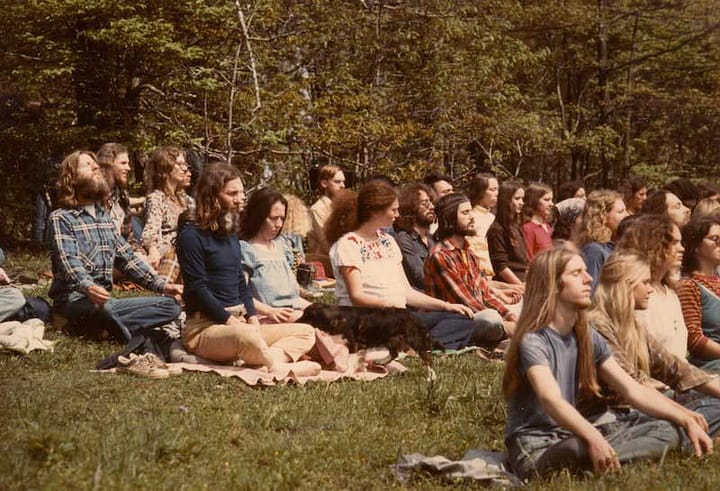 hippie-commune-group-prayer