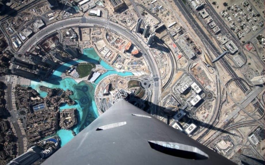 24 of the most creepy places on the planet to look down (56 HQ Photos) Burj Khalifa is 2,700 feet tall. For perspective, that’s around twice as tall as the Empire State Building. If you’re brave enough, you can overlook Dubai from what is likely the most awe-inspiring observation deck in the world.