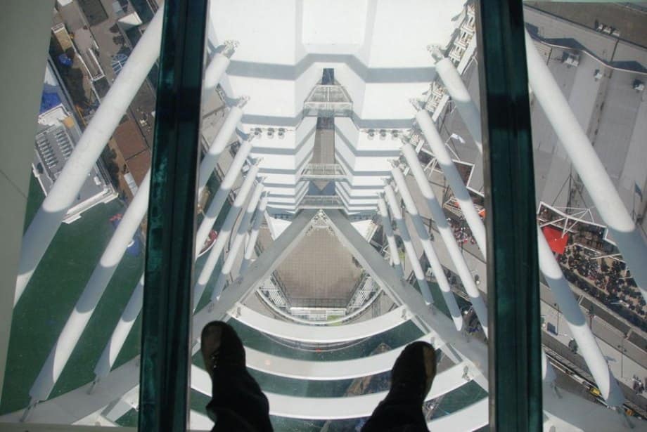 24 of the most creepy places on the planet to look down (56 HQ Photos) Spinnaker Tower is the tallest tower in the UK outside of London, standing at 560 foot tall. The crows nest is the highest of three observation platforms, and with only a wire mesh roof, it’s entirely open to the elements.